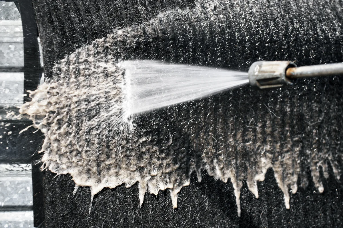 Gutter cleaning services in Grand Blanc, MI by Wipeout Pressure Washing & Staining